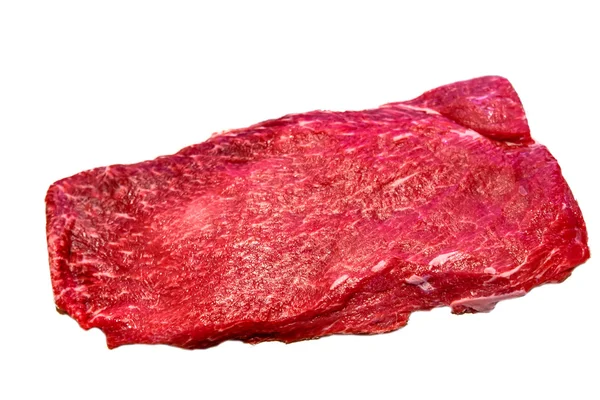 A lapos vas steak fekszik egy fehér háttér. Szigetelt — Stock Fotó