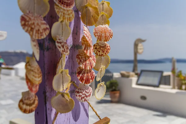 Lilla skal dekoration på havet bakgrund — Stockfoto