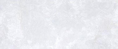 Yumuşak açık gri mermer yüzey hassas bulutlu desenlere ve pürüzsüz doğal dokulara sahiptir. İç tasarım, fayanslar, markalaşma ve modern tasarım için mükemmel olan zarif nötr taş arka plan.