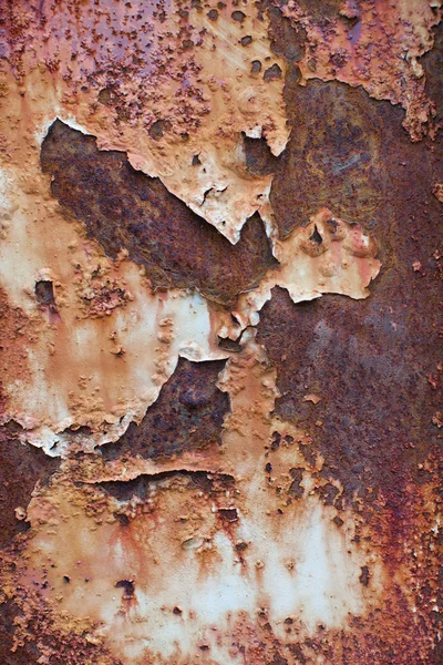 Rusted white painted metal wall. Rusty metal background with streaks of rust. Rust stains. The metal surface rusted spots. Rysty corrosion