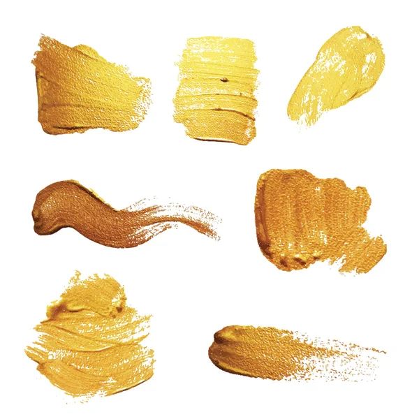 Vector gold paint smear stroke stain set. Abstract gold  texture — Stock Vector
