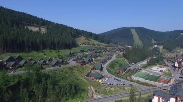 Aerial village in mountain. Ski Resort in the summer. Bukovel Ukraine — Stock Video