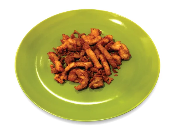 Cerdo frito en plato verde sobre fondo blanco . — Foto de Stock