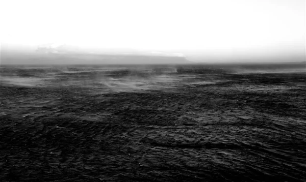 Seascape with the Atlantic Ocean on a stormy morning monochrome