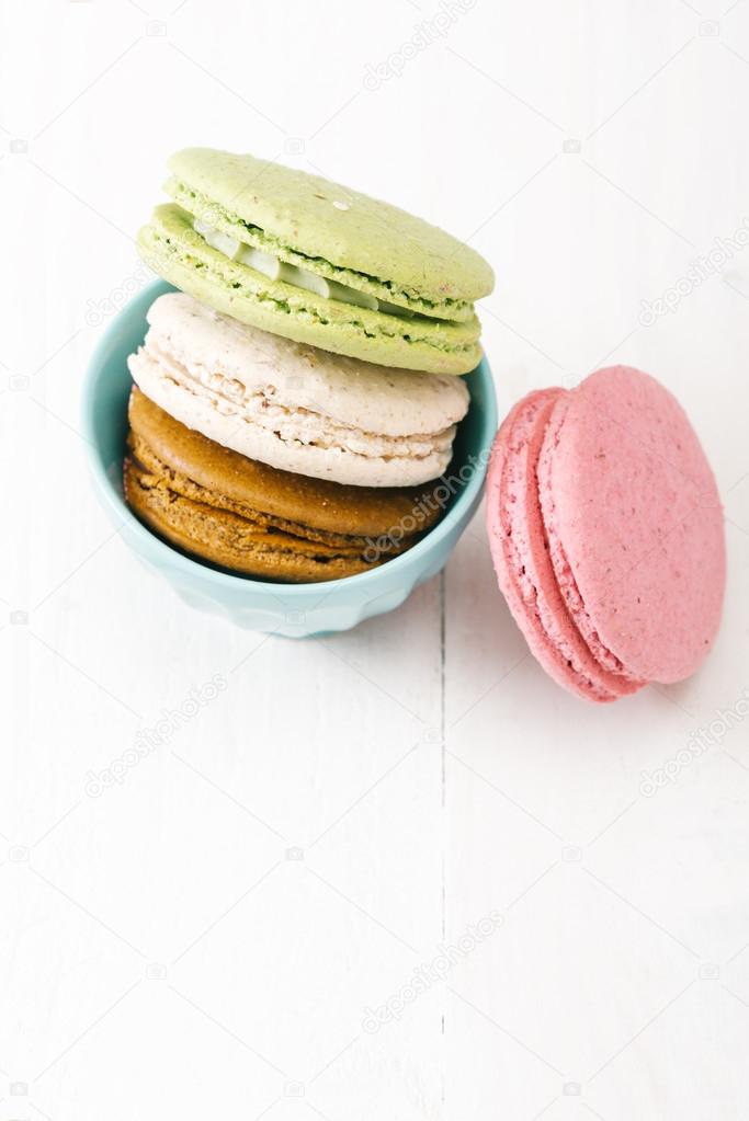 Homemade  macaroons on white table.