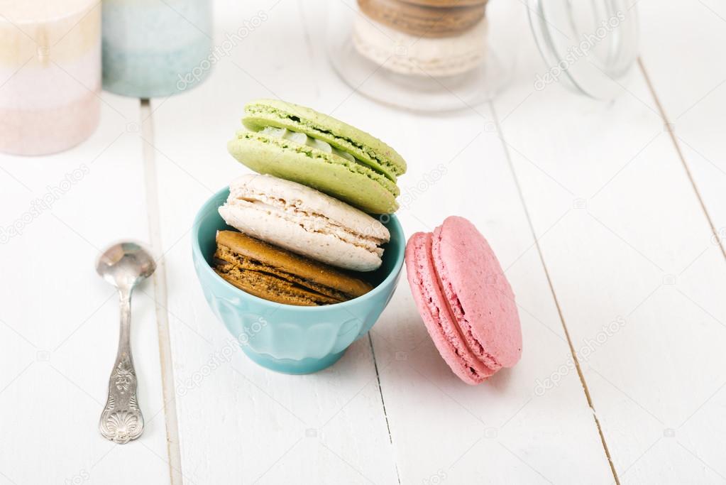 Homemade  macaroons on white table.