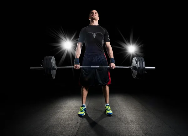 Crossfit athlete performs weight lift — Stock Photo, Image