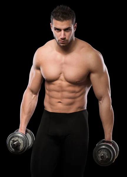 Muscular men exercise with dumbbells. Royalty Free Stock Photos