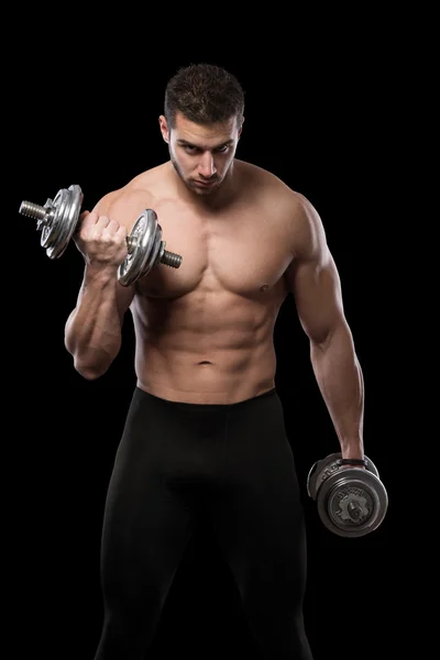 Muscular men exercise with dumbbells. Stock Photo
