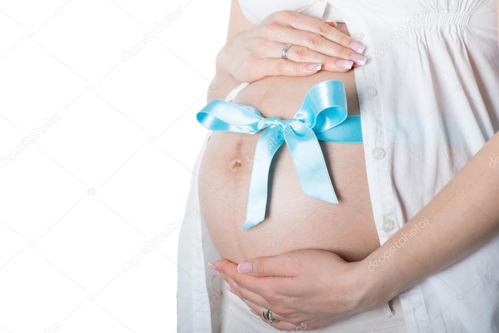 Six months pregnant belly