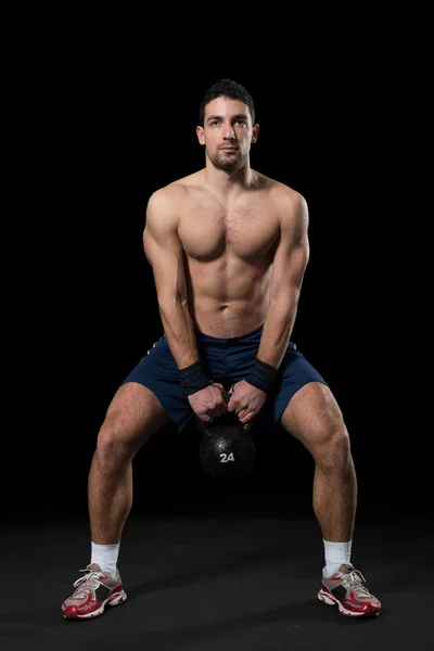 Muscular Men Doing Pull Ups as part of Crossfit Training. Stock Photo by  ©SerbBgd 91029958