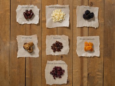 Dried fruit on the vintage table. clipart