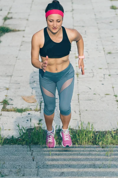 Woman Running Down the Stairs.Photo is carefully post processed to mach old Kodak film look — Stock Photo, Image