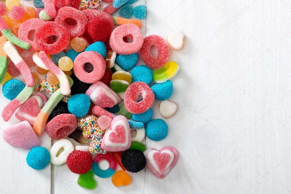 Candy on white table.