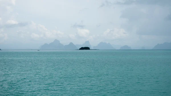 The Islet in the Bay on a Rainy Day. Islands at Phang Nga Bay near Krabi and Phuket. Thailand.
