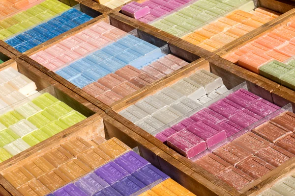 stock image Assortment of bars of soap at the market