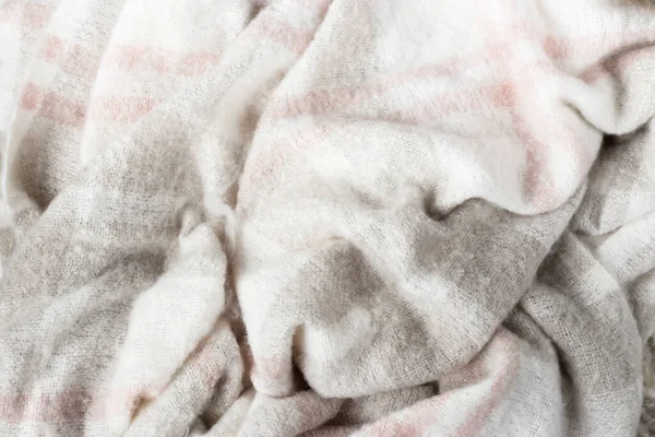 Crumpled gray wool blanket. Soft and warm fabric crumpled in folds. Autumn or winter vibe texture — Stock Photo, Image