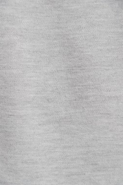 Gri kumaş dokusu. Kıyafet arka planı. Kapat.