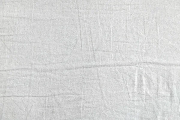 Beyaz kumaş dokusu. Kıyafet arka planı. Kapat.