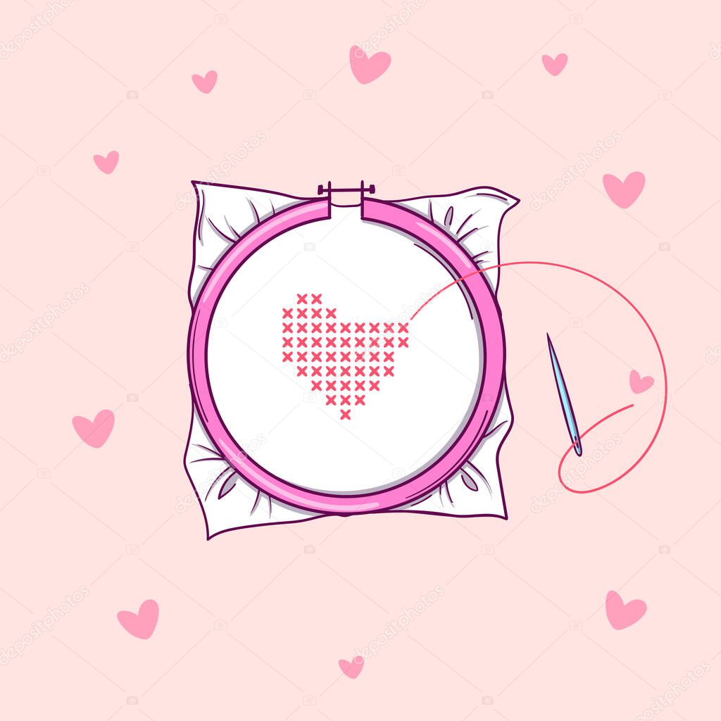 Embroidery hoops with red heart embroidered with a cross on pink background with hearts
