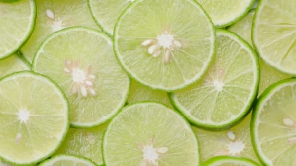 Top View Limes Slices Rotation Close — Stockvideo