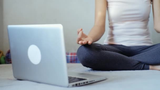 Young Asian Woman Meditating Lotus Position Bedroom Using Laptop Digital — Stock Video