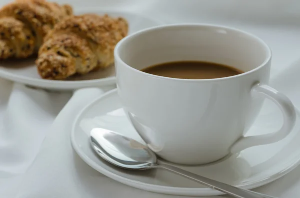 Hot Coffee and Sesame Croissants.