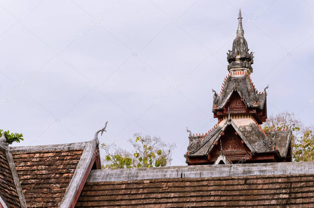 Antique Ceramic Roof of Porch's Gate of Wat Sisaket Monastery is a Landmark of Vientiane Capital City of Laos.