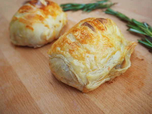 Beef Wellington on wood plate — Stock Photo, Image