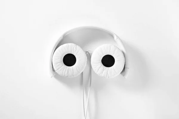 Folded Headphones Black White Style Light Background Center — Stock Photo, Image