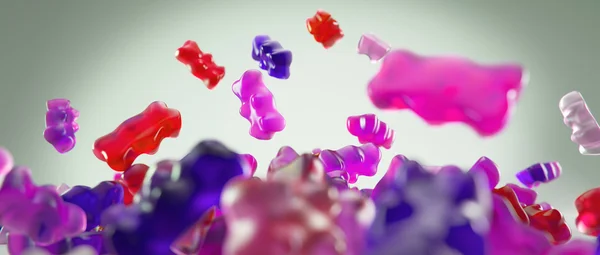 Transparente rosa doce goma ursos caindo fundo — Fotografia de Stock