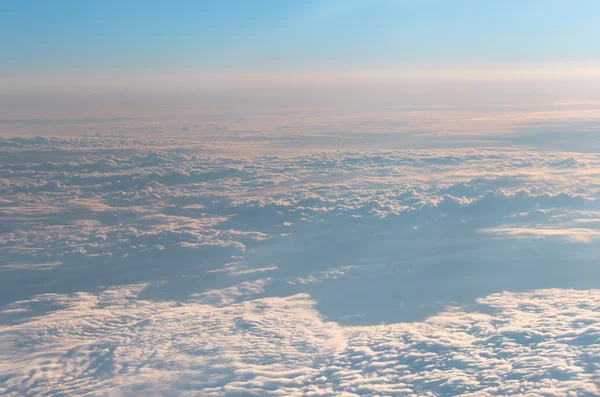 Sky and clouds from an airplane window — Stock Photo, Image