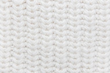 Beyaz örülmüş kumaş dokusu. Yün arkaplan.