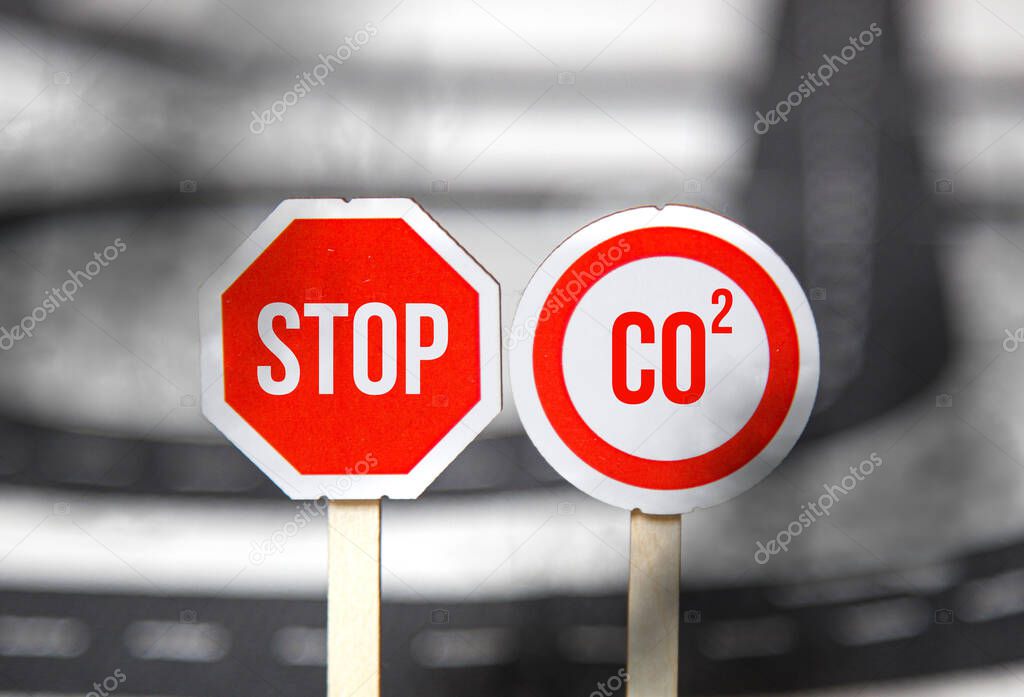 Sign with STOP CO2. the problem of environmental pollution, carbon emissions from cars and factories. carbon footprint