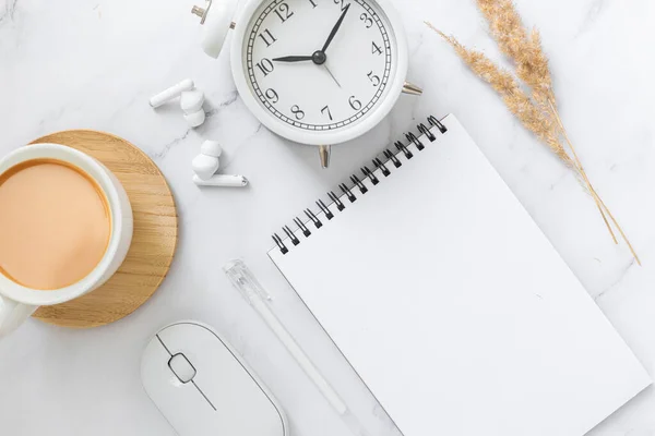 Blank sheet of paper notebook and cup on marble office desk. — Stock Photo, Image