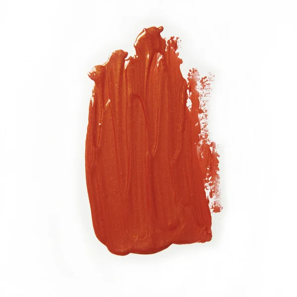 Oranje vlekkerig lipgloss — Stockfoto