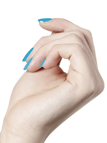Main avec vernis à ongles bleu — Photo