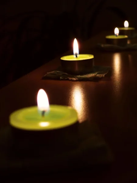 Burning candles in the dark — Stock Photo, Image