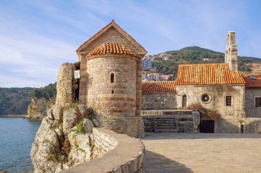 Religious architecture. Montenegro. Old Town of Budva. Church of Santa Maria in Punta and church of St. Sava clipart