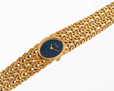 Levrette el yaralanması saati, 1970 'ler, referans 4222, 18 kt sarı altın çanta ve mavi kadranlı entegre bilezik. Milan, İtalya, 14 Nisan 2025