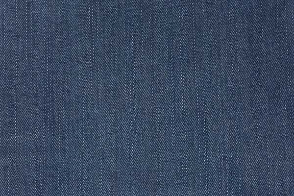 Textura y fondo vaquero azul jean . — Foto de Stock