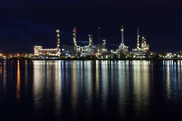 Beautiful light of oil refinery factory in night time.