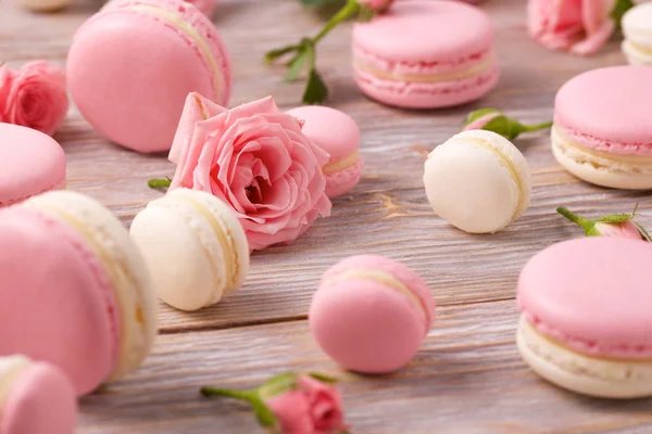 French dessert macarons with rose flowers