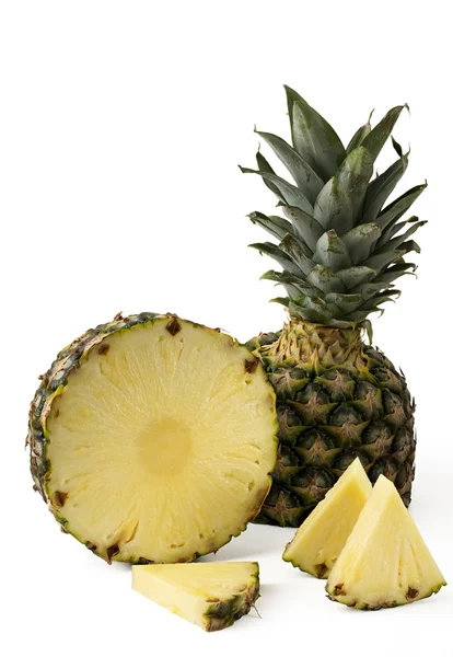 Pineapple with slices isolated on white background — Stock Photo, Image