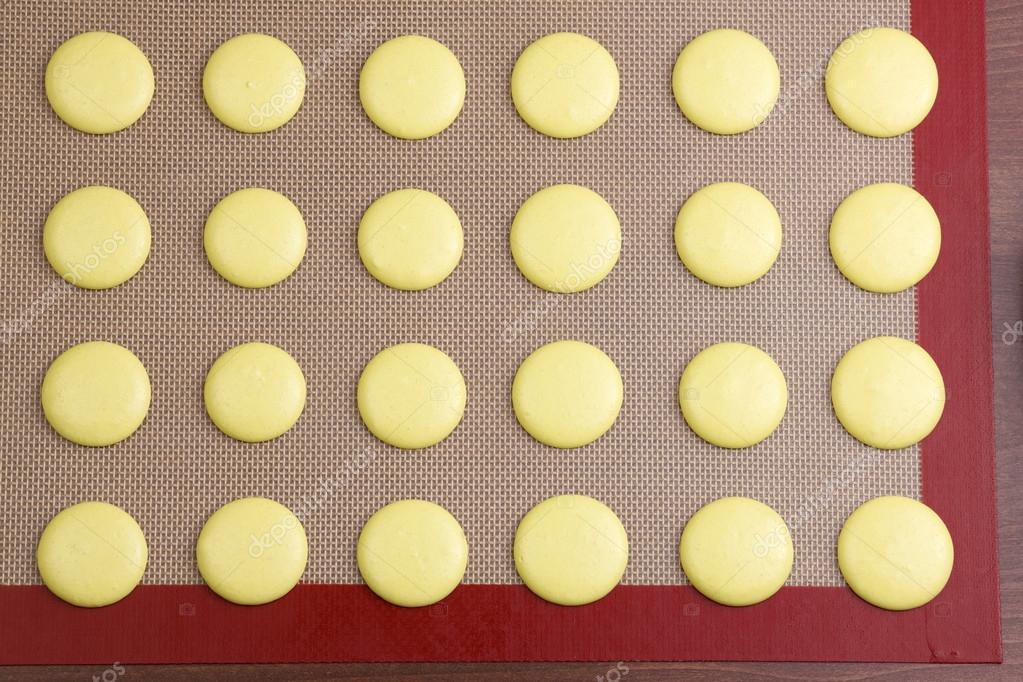 Macarons On A Silicone Mat Top View Stock Photo C Kivphotomaker