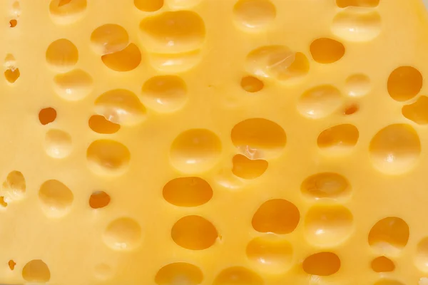 Текстура скибочки сиру — стокове фото