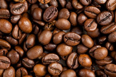 Kavrulmuş kahve çekirdekleri, üstten görünüm dokusuna.