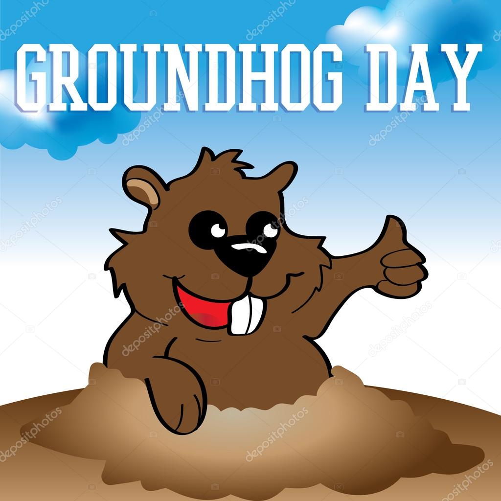 Cute groundhog popping out of a hole.