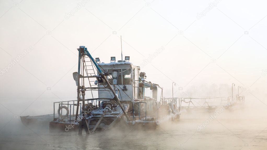 dredge boat in the fog