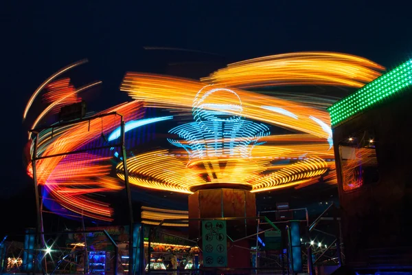 Carousels at night Royalty Free Stock Images